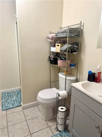 a bathroom with a toilet and a sink