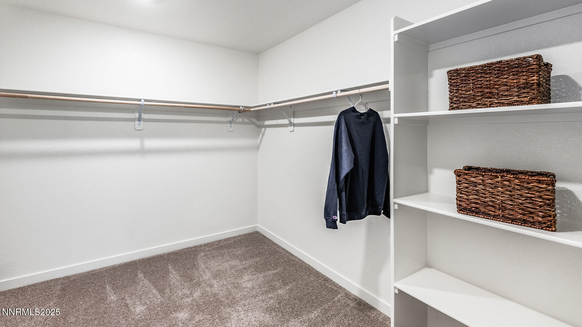 7836 Lazy Stream Drive, Unit 151 Reno, NV 89506 - Photo 18 of 25 a view of walk in closet with clothes and shoes