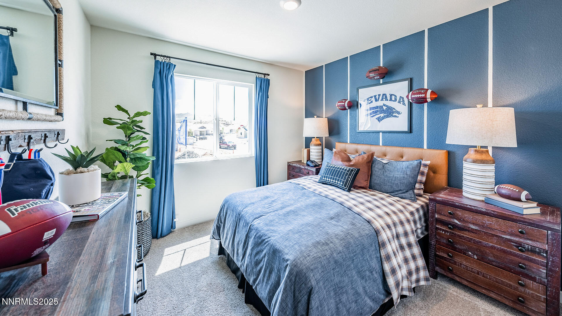 7836 Lazy Stream Drive, Unit 151 Reno, NV 89506 - Photo 24 of 25 a bedroom with a bed and a potted plant