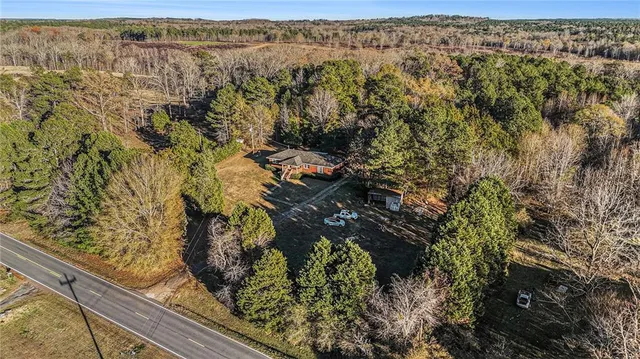 a view of residential houses with outdoor space