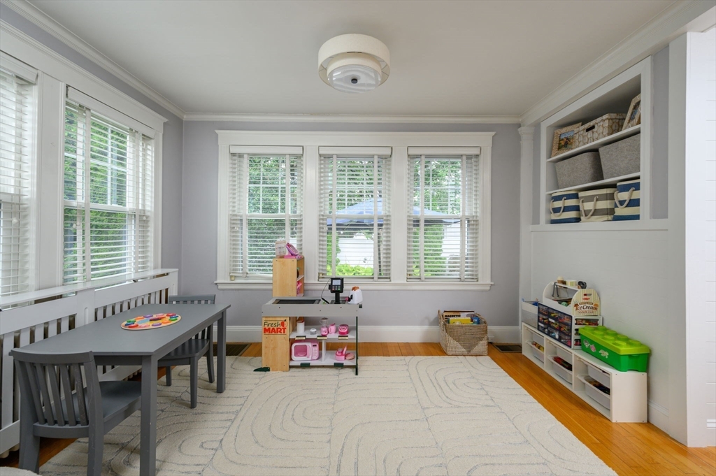 45 Rowe Street Milton, MA 02186 - Photo 14 of 34 a living room filled with furniture and a large window