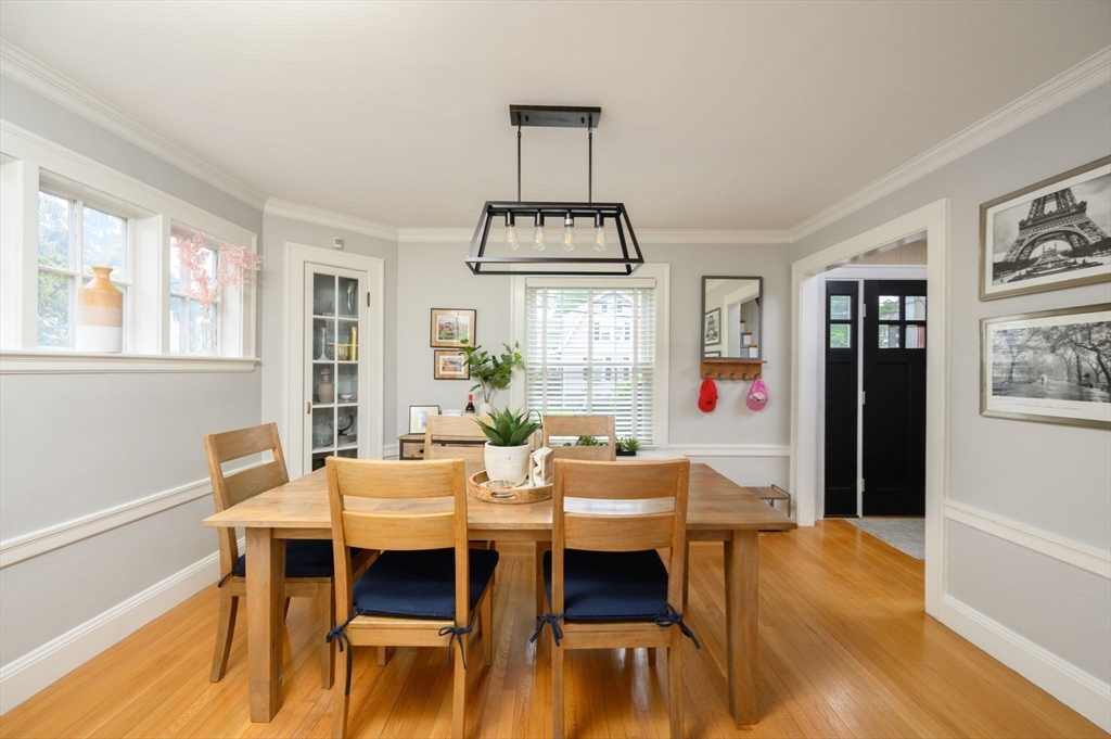 45 Rowe Street Milton, MA 02186 - Photo 6 of 34 a view of a dining room with furniture window and wooden floor