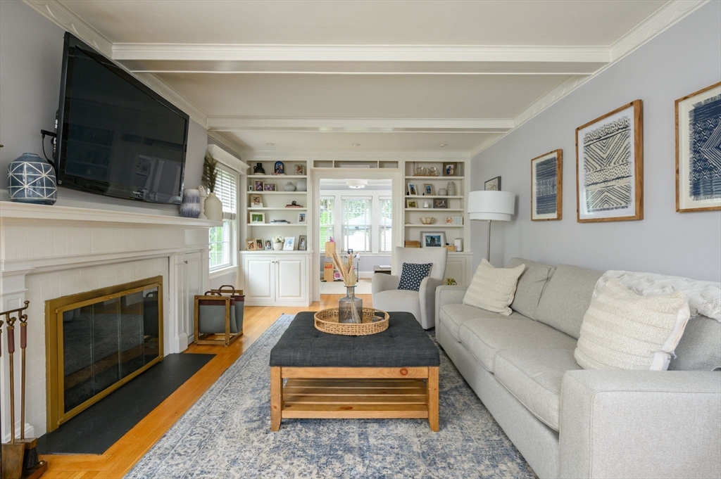 45 Rowe Street Milton, MA 02186 - Photo 10 of 34 a living room with furniture fireplace and flat screen tv