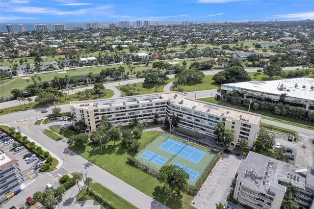 an aerial view of a house with a garden