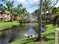 a view of a lake view with a garden