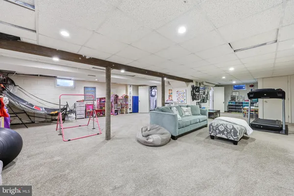 a living room with furniture and a couch