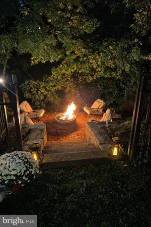 a view of a backyard of a house with a yard