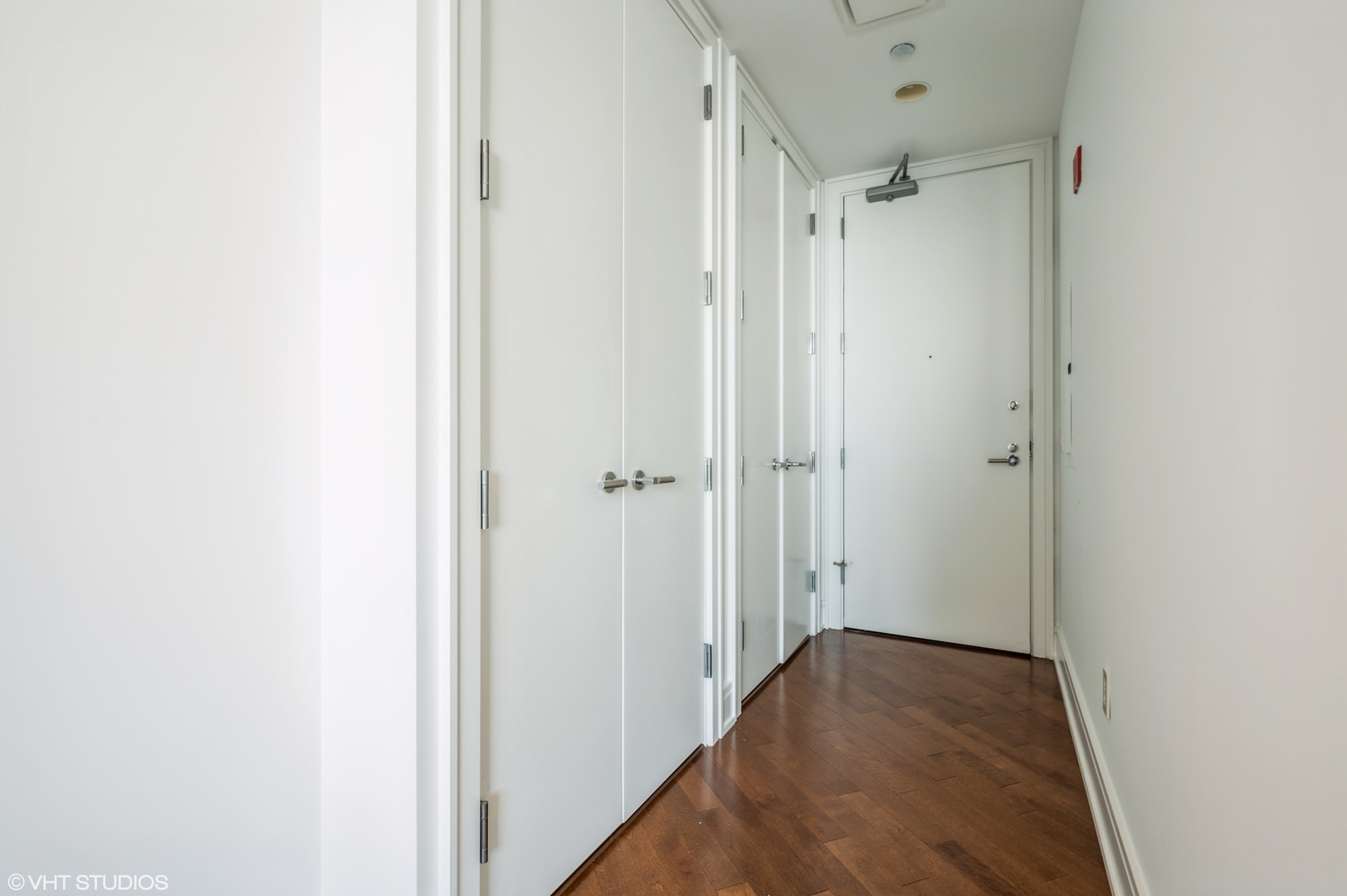401 North Wabash Avenue, Unit 31F Chicago, IL 60611 - Photo 2 of 13 a view of a hallway with wooden floor