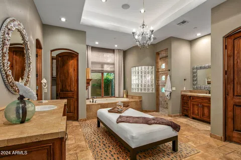 a view of swimming pool with outdoor seating and city view