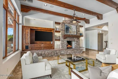 a view of a large kitchen with a sink and cabinets