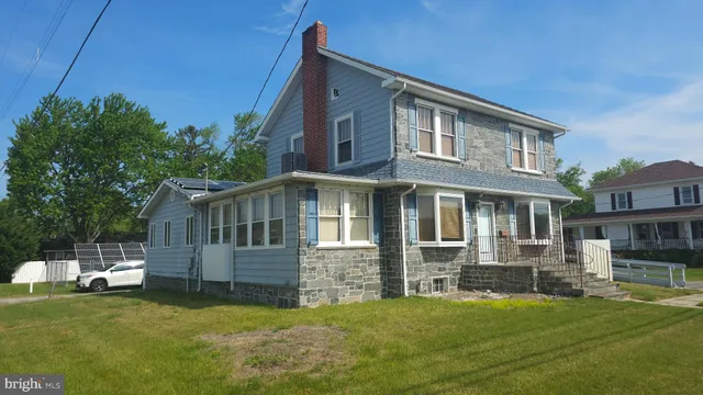 a view of a house with a big yard