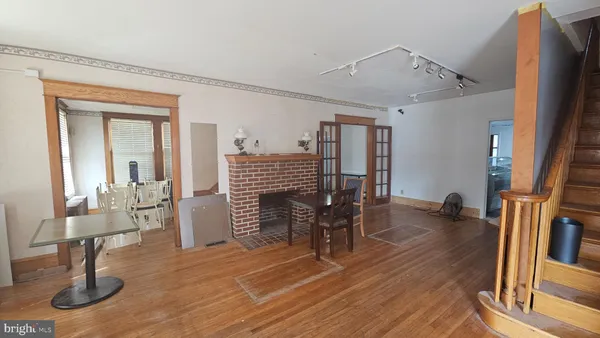 a view of a livingroom with furniture and window