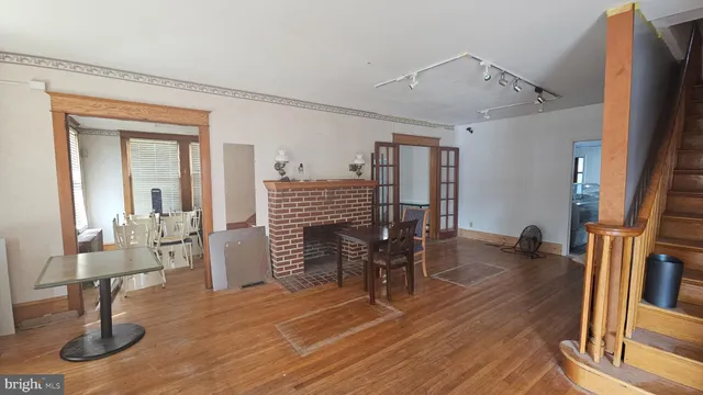 a view of a livingroom with furniture and window