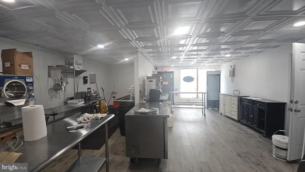 a kitchen with lots of counter top space and a sink