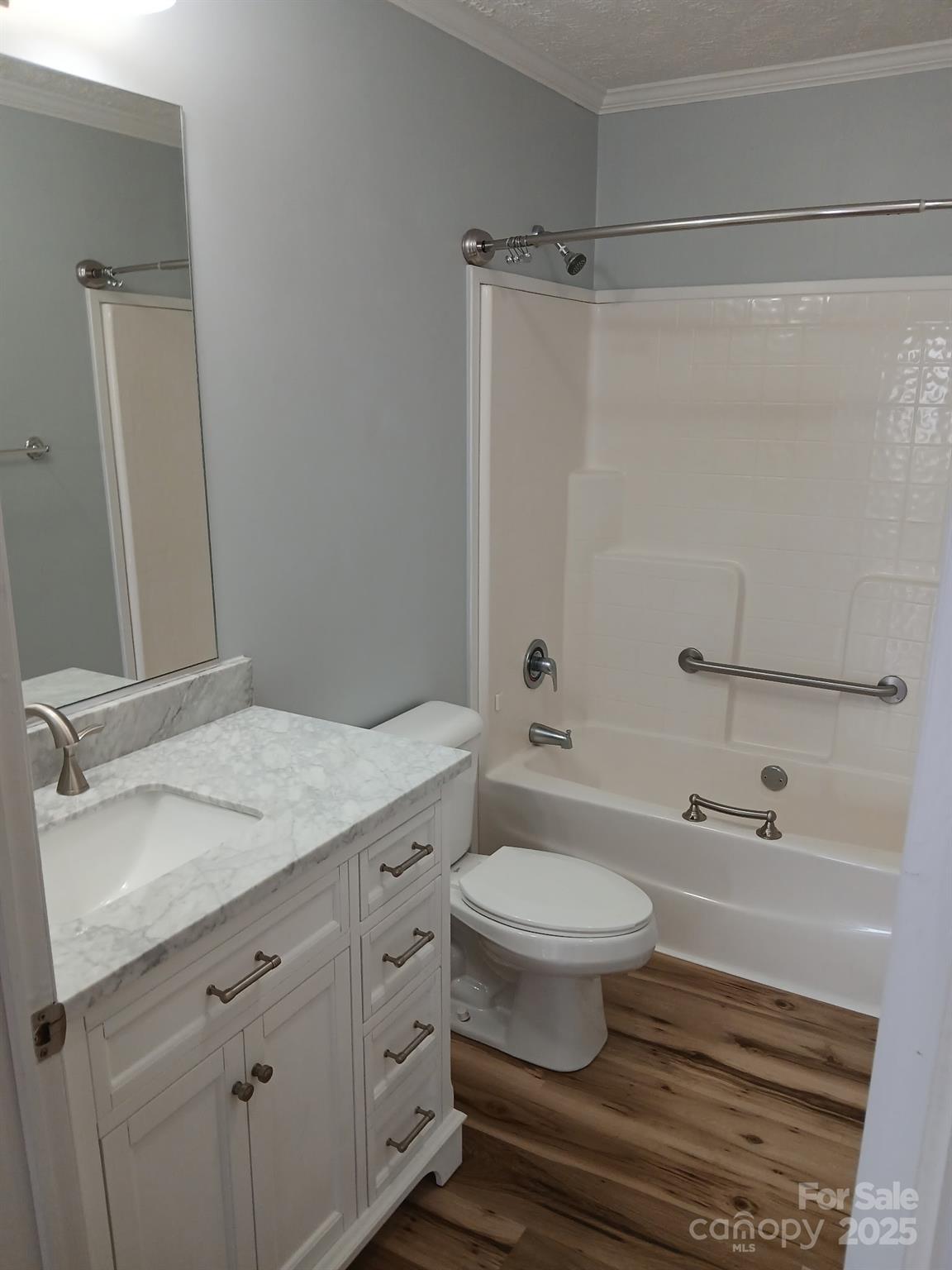 218 Muldoon Lane Clover, SC 29710 - Photo 13 of 26 a bathroom with a sink toilet a mirror and shower