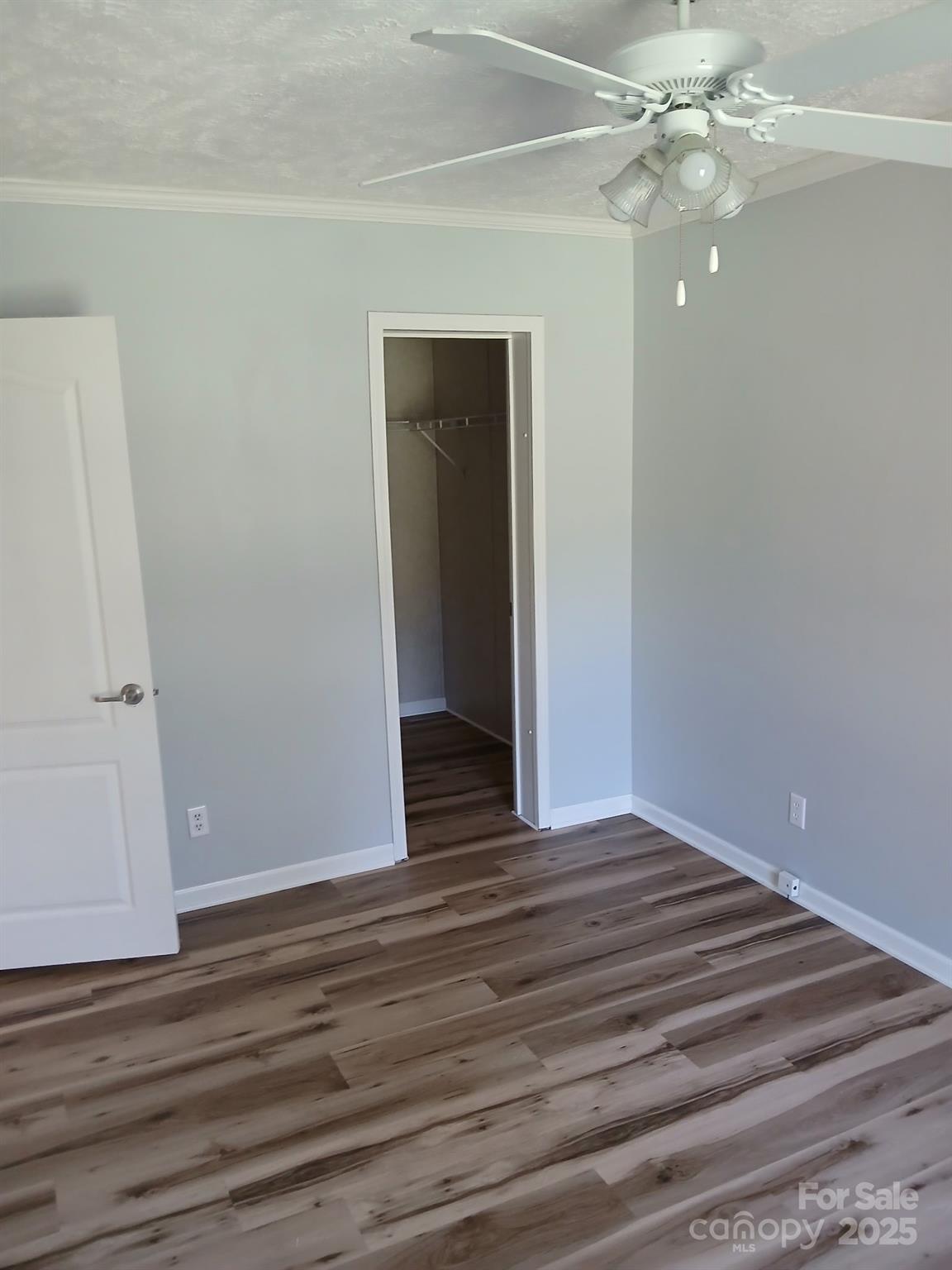 218 Muldoon Lane Clover, SC 29710 - Photo 14 of 26 a view of an empty room with wooden floor