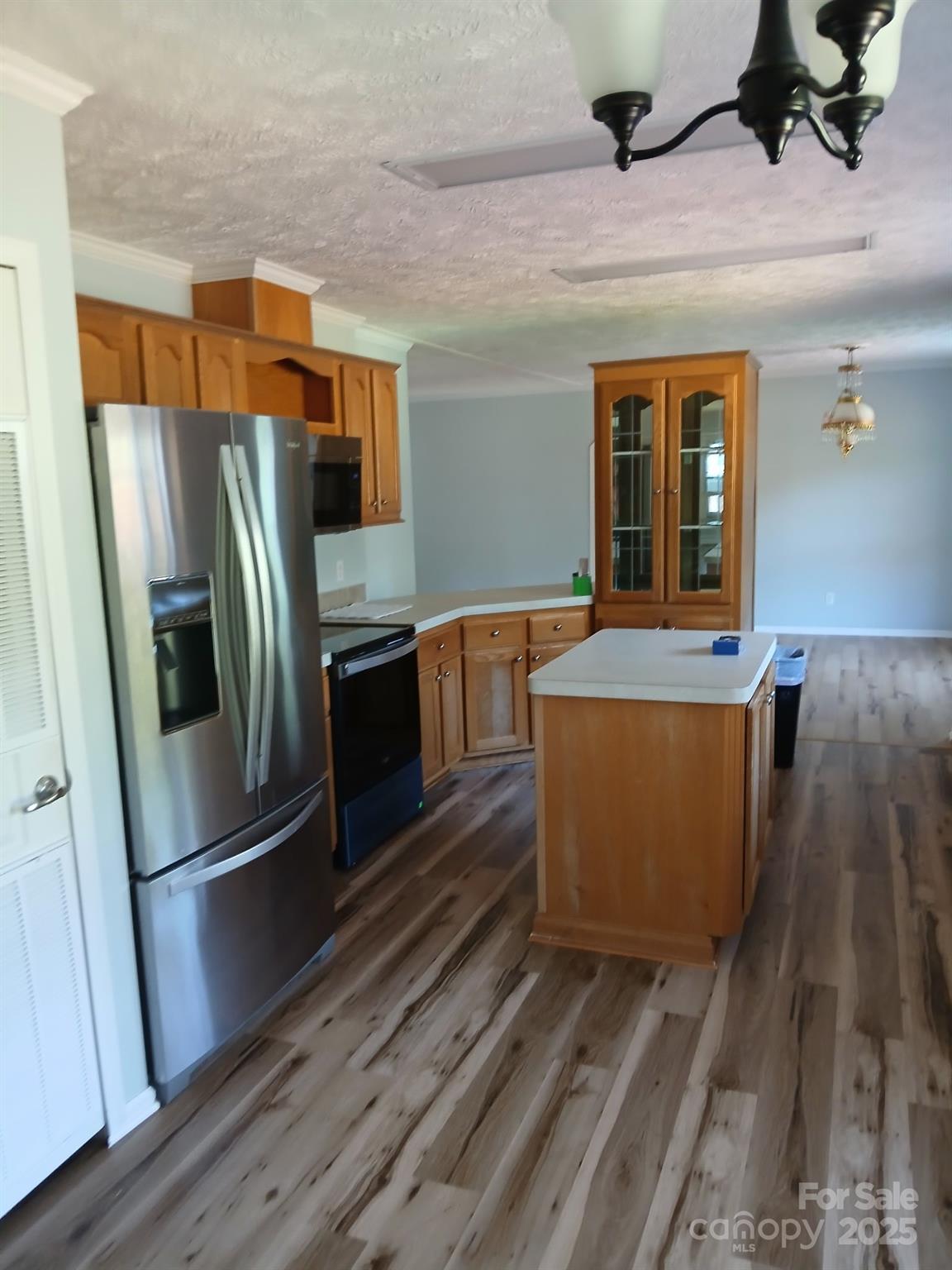 218 Muldoon Lane Clover, SC 29710 - Photo 17 of 26 a kitchen with stainless steel appliances granite countertop a refrigerator a stove and a sink