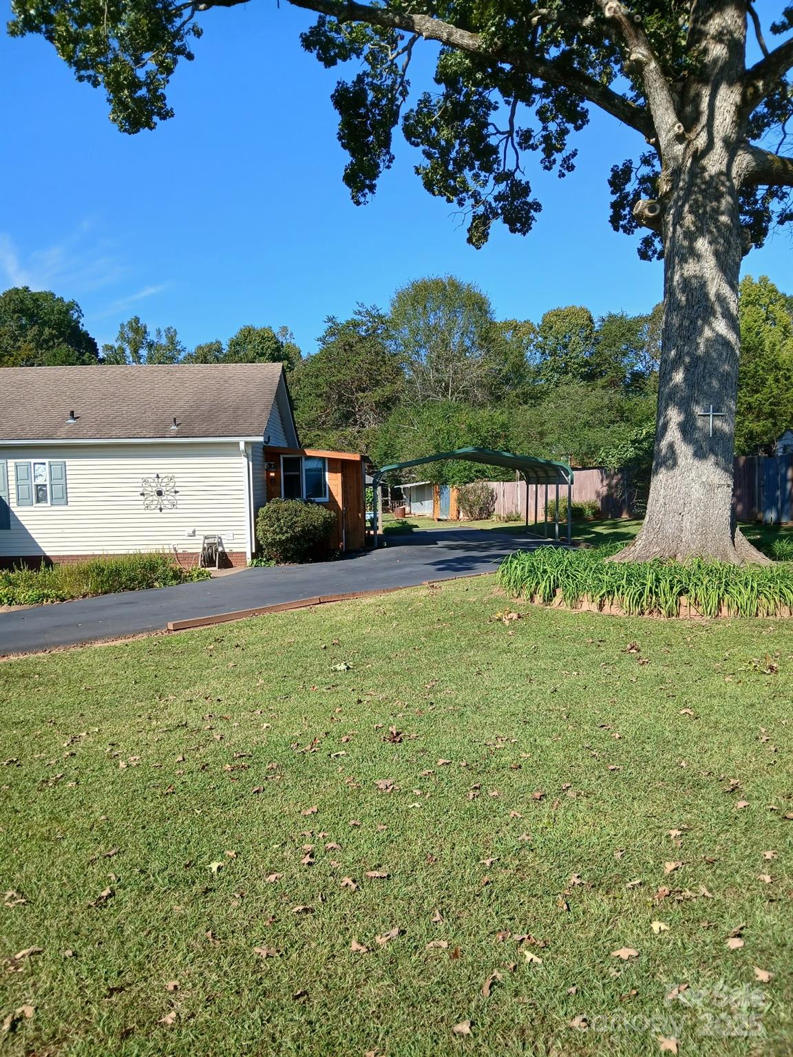 218 Muldoon Lane Clover, SC 29710 - Photo 3 of 26 a view of house with outdoor space and garden
