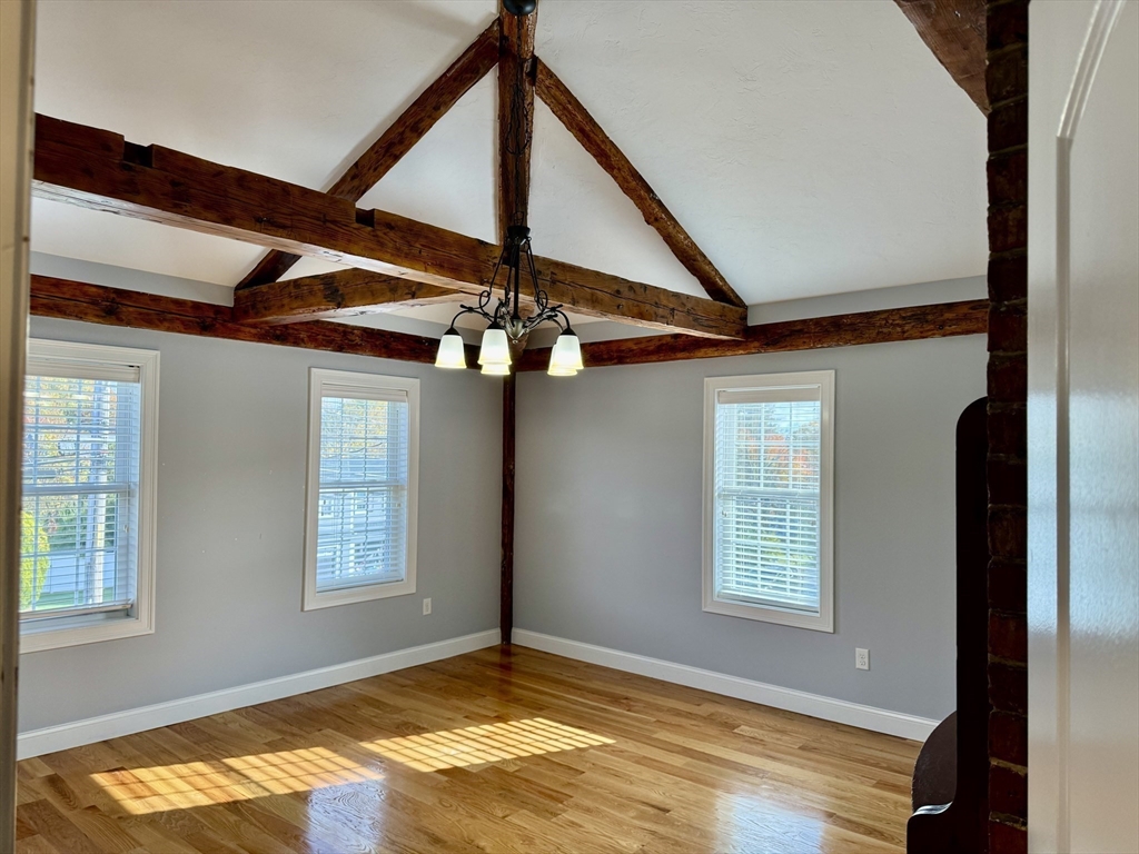 722 Lowell Street, Unit A Peabody, MA 01960 - Photo 12 of 40 a view of empty room with window and ceiling fan
