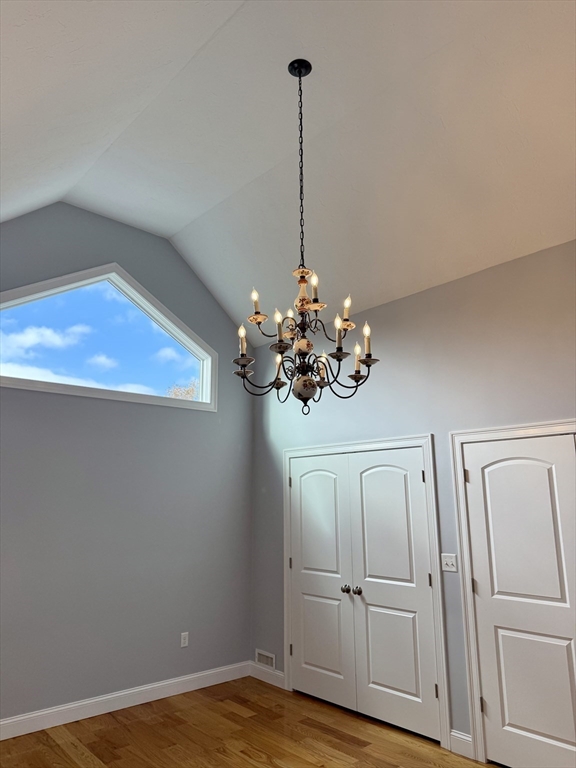 722 Lowell Street, Unit A Peabody, MA 01960 - Photo 37 of 40 a view of a room with wooden floor