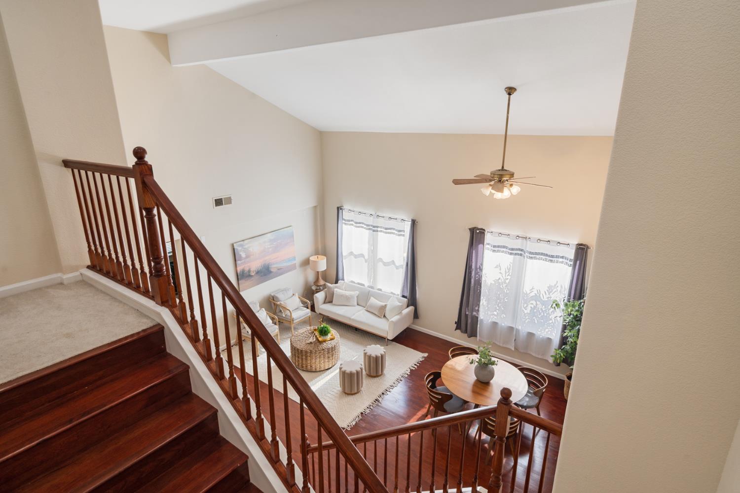 2603 Bellows Street Davis, CA 95618 - Photo 22 of 50 a view of a livingroom with furniture wooden floor and staircase