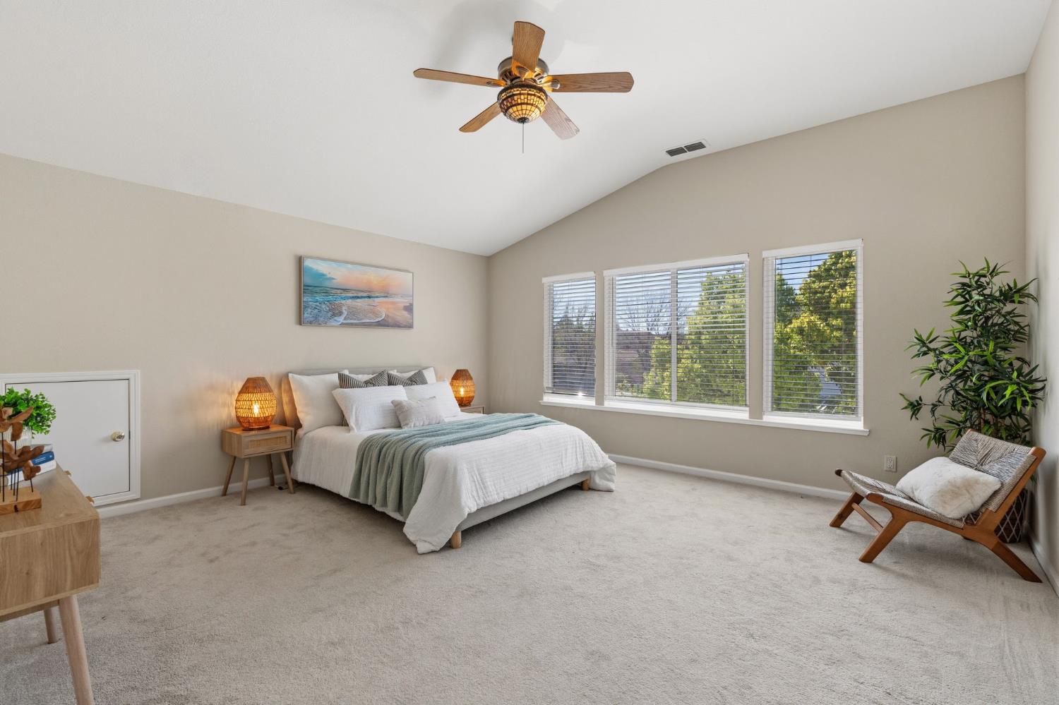 2603 Bellows Street Davis, CA 95618 - Photo 24 of 50 a bed room with a bed and a chandelier