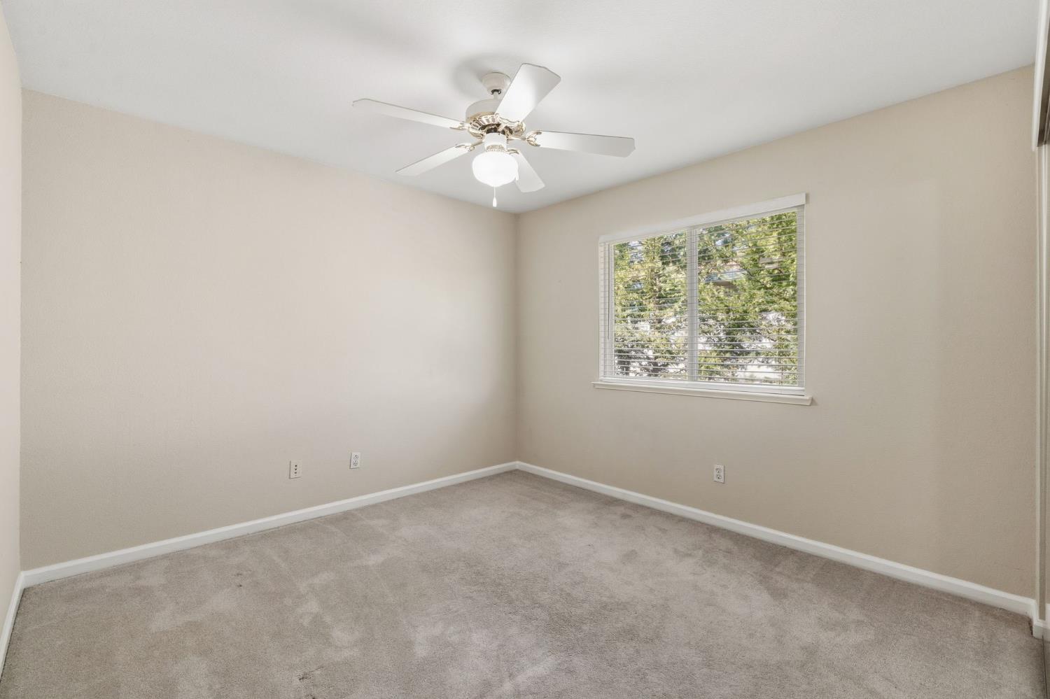 2603 Bellows Street Davis, CA 95618 - Photo 29 of 50 an empty room with a window and a fan