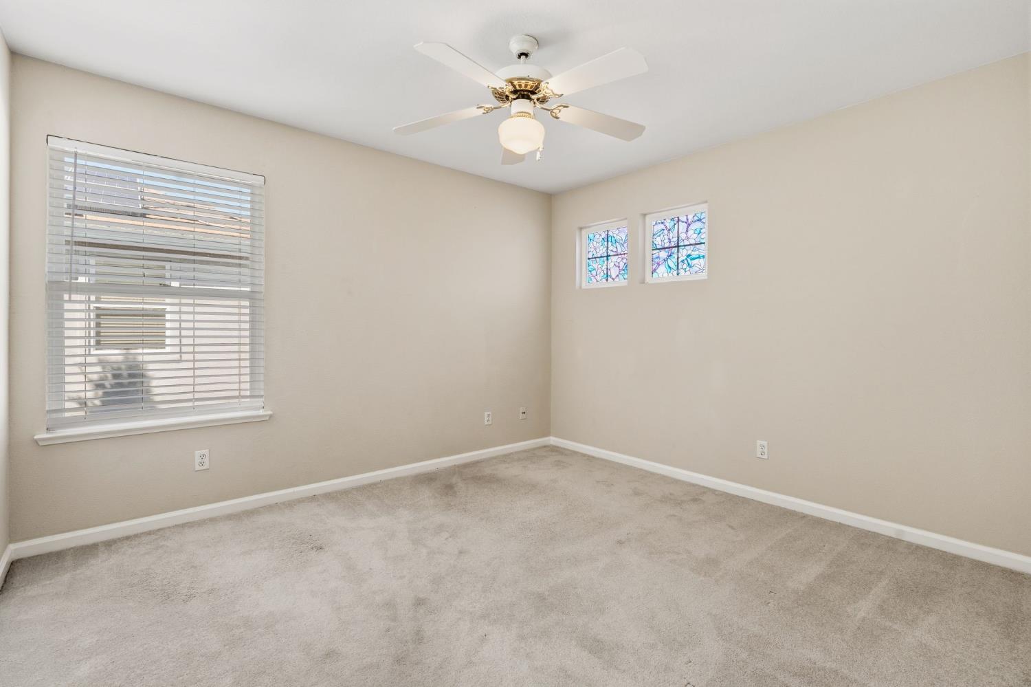 2603 Bellows Street Davis, CA 95618 - Photo 30 of 50 an empty room with a window and a ceiling fan