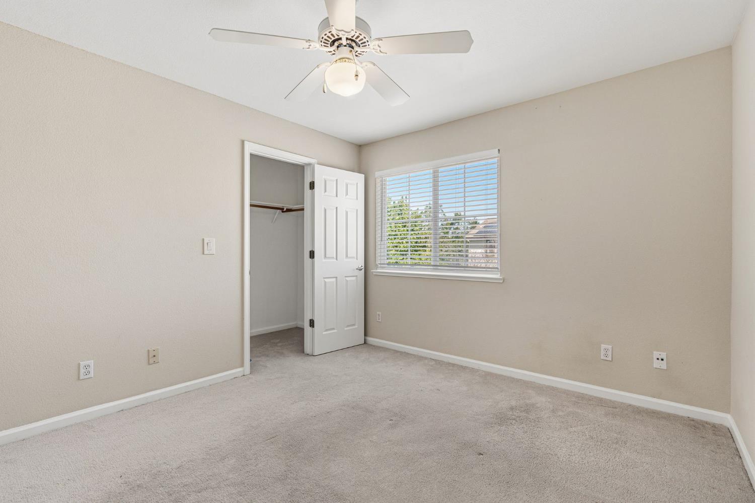 2603 Bellows Street Davis, CA 95618 - Photo 34 of 50 an empty room with a window and a fan