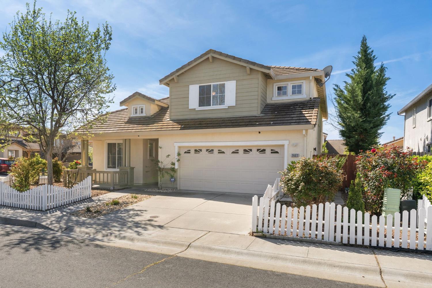 2603 Bellows Street Davis, CA 95618 - Photo 6 of 50 a front view of a house with a garden