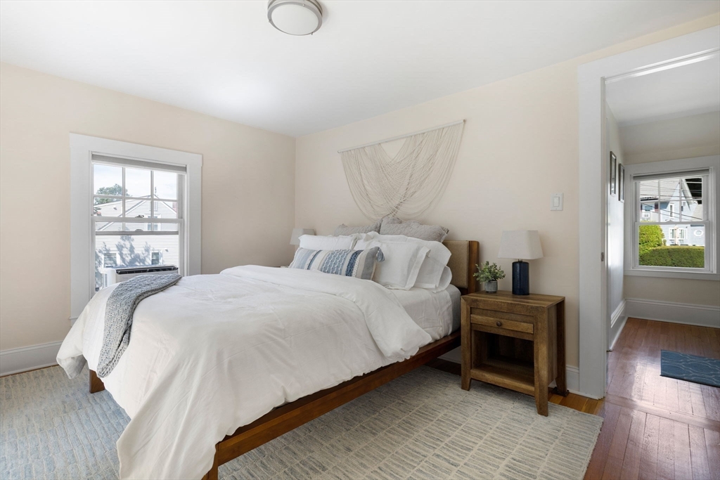 80 Washington Street Stoneham, MA 02180 - Photo 11 of 21 a bedroom with a bed and a window