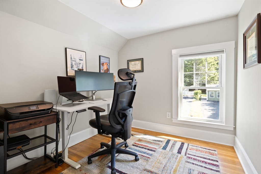 80 Washington Street Stoneham, MA 02180 - Photo 13 of 21 a view of a workspace with furniture and a window