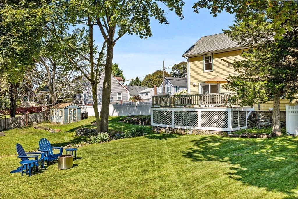 80 Washington Street Stoneham, MA 02180 - Photo 16 of 21 a view of a house with a patio