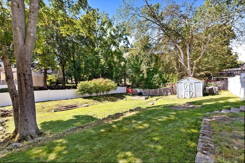 80 Washington Street Stoneham, MA 02180 - Photo 17 of 21 a view of a house with a yard