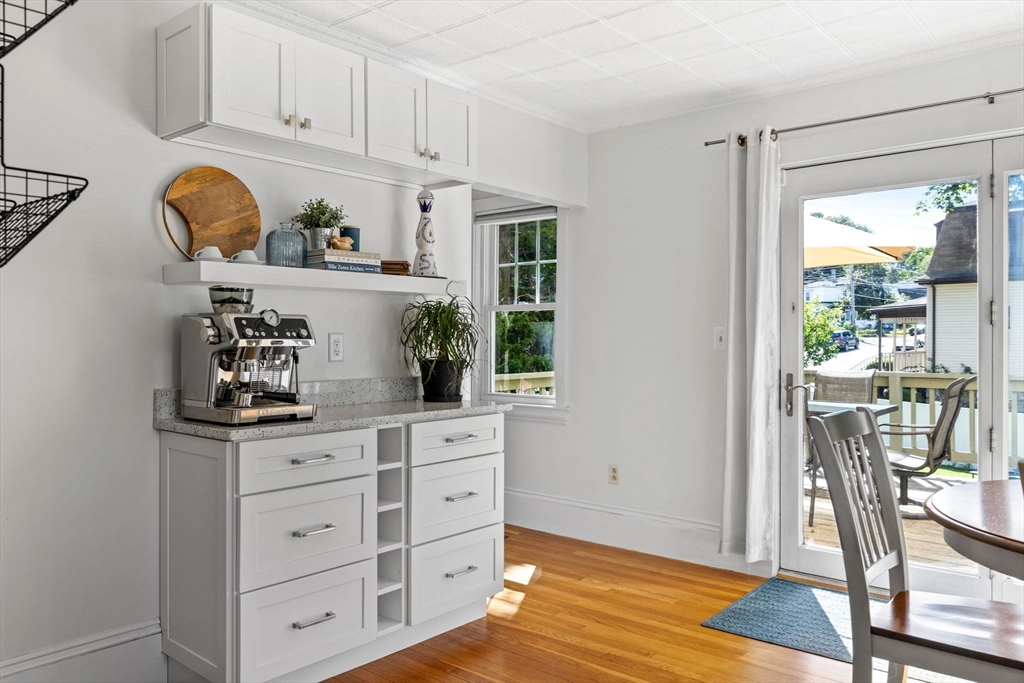 80 Washington Street Stoneham, MA 02180 - Photo 6 of 21 a kitchen with a refrigerator and window