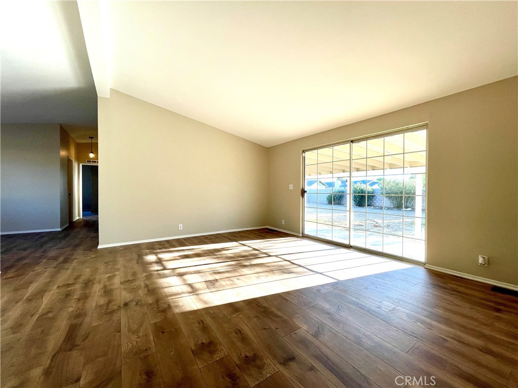12546 Navajo Road Apple Valley, CA 92308 - Photo 5 of 27 Large open living room with natural light.