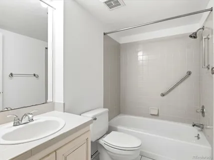 a view of an empty room with a balcony