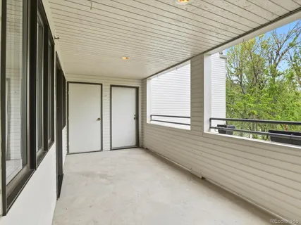 a view of a swimming pool with a chair
