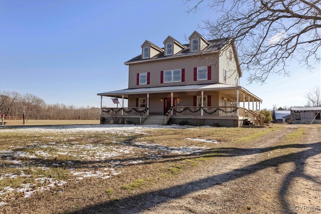 3008 New Design Road Dendron, VA 23839 - Photo 2 of 46 a front view of a house with a ocean view
