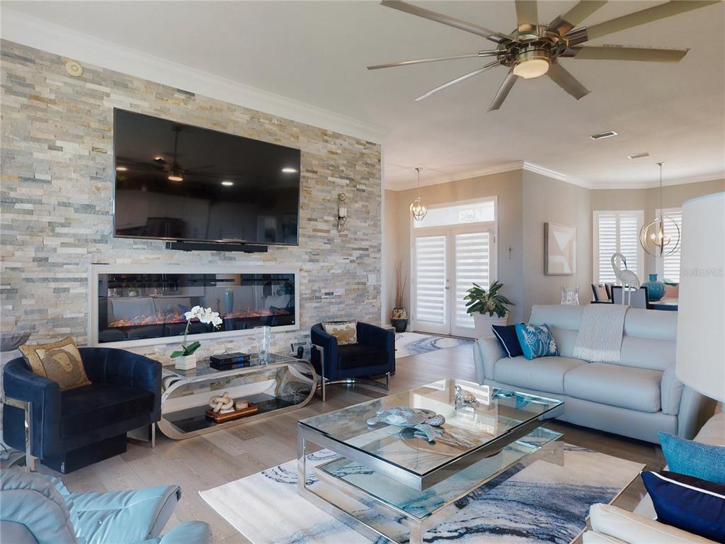 2019 South Riverside Drive Edgewater, FL 32141 - Photo 11 of 94 a living room with furniture and a fireplace