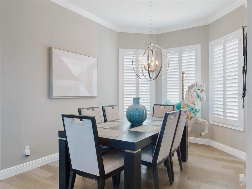 2019 South Riverside Drive Edgewater, FL 32141 - Photo 23 of 94 a view of a dining room with furniture window and outside view