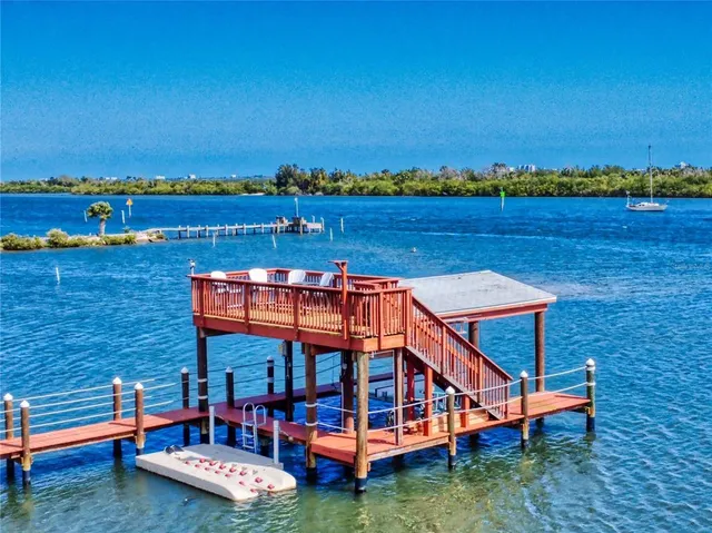 a view of a lake with a building in the background