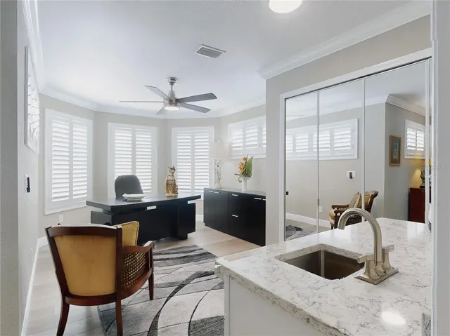 an aerial view of residential house with outdoor space and swimming pool