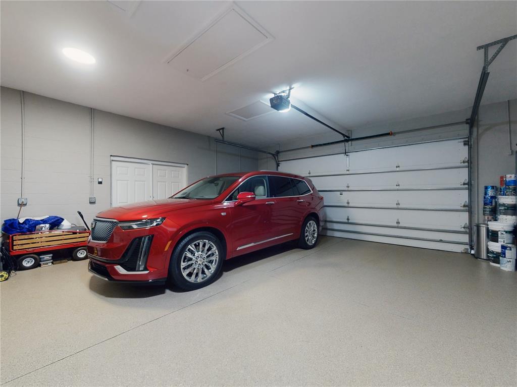 2019 South Riverside Drive Edgewater, FL 32141 - Photo 56 of 94 a view of a garage and car parked