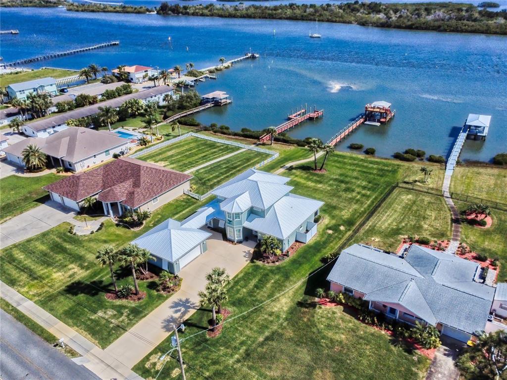 2019 South Riverside Drive Edgewater, FL 32141 - Photo 59 of 94 an aerial view of residential house with outdoor space and swimming pool