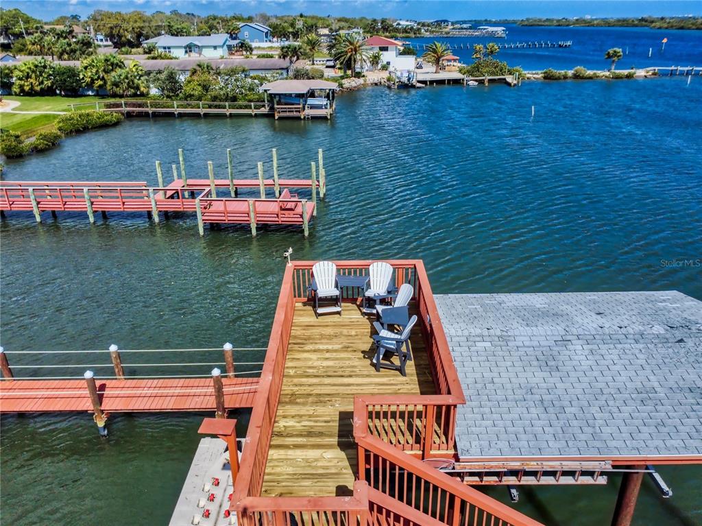 2019 South Riverside Drive Edgewater, FL 32141 - Photo 72 of 94 an aerial view of a house with outdoor seating lake view and boat