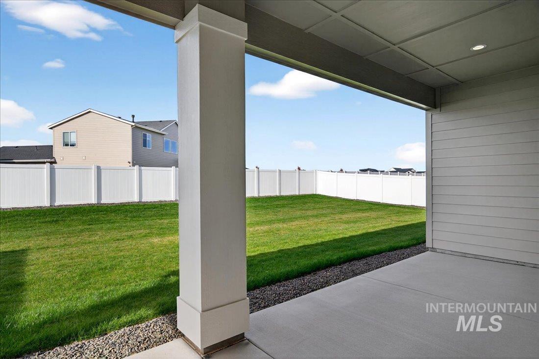 9131 West Moonglade Street Star, ID 83669 - Photo 12 of 22 Fenced backyard featuring a patio area
