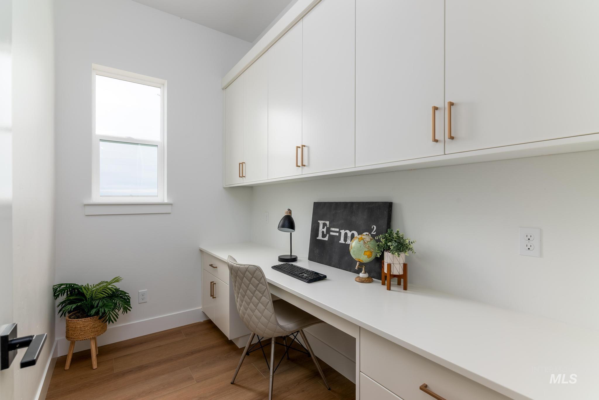 9131 West Moonglade Street Star, ID 83669 - Photo 10 of 22 Office space featuring built in desk and light wood-style floors