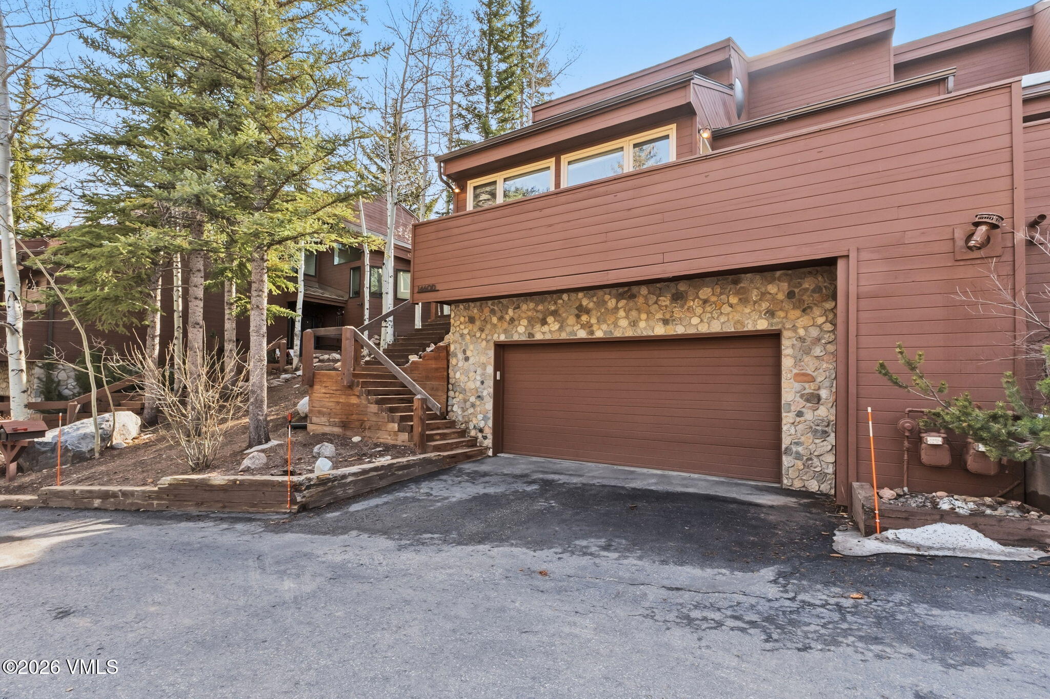 1460 Ridge Lane, Unit D Vail, CO 81657 - Photo 18 of 18 a front view of a house with yard