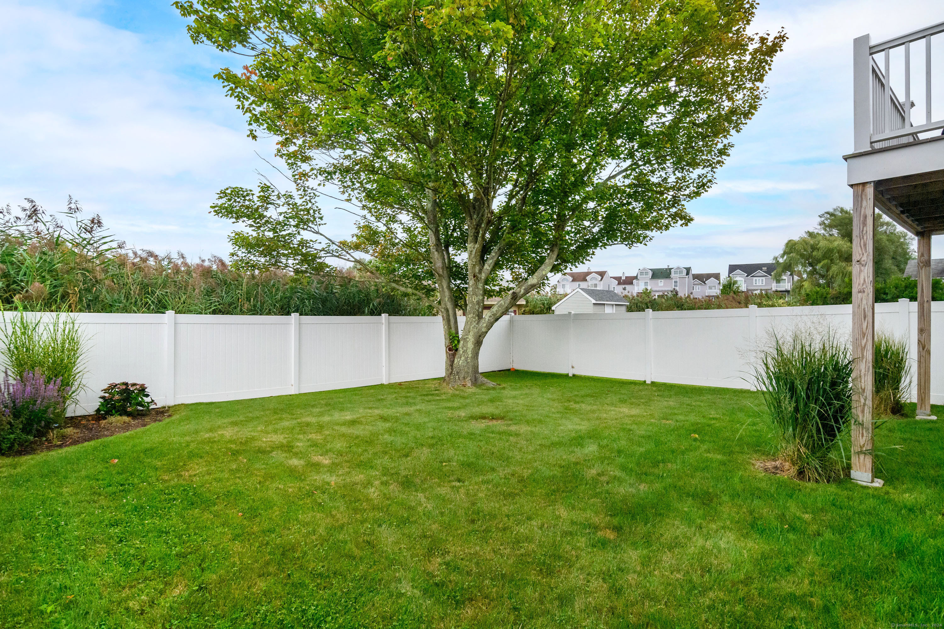 1039 Reef Road Fairfield, CT 06824 - Photo 25 of 26 a view of yard with swimming pool and green space